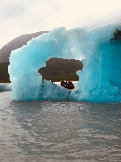 Hole in Iceberg, raft boat in view
