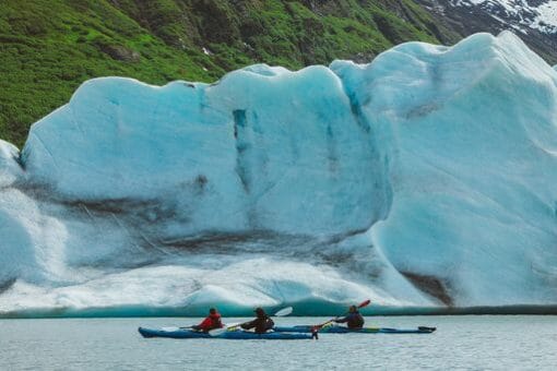 Kayakers going by Spencer Iceberg